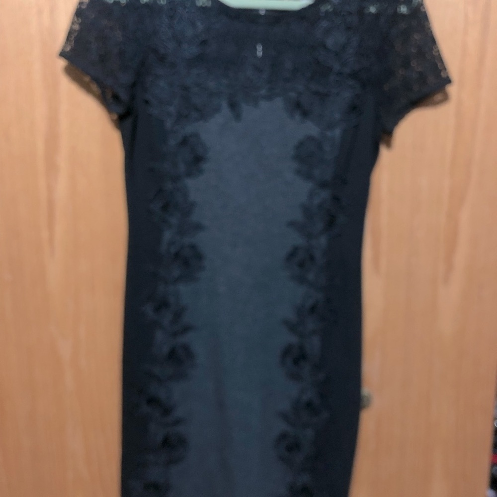 Beautiful dress with lace detailing.